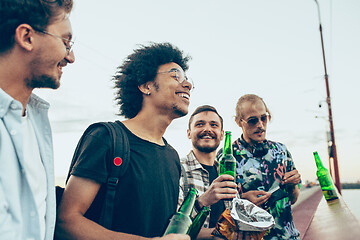 Image showing Group of friends celebrating, resting, having fun and party in summer day