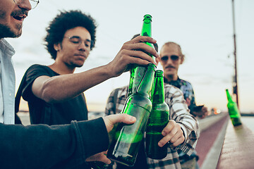 Image showing Group of friends celebrating, resting, having fun and party in summer day