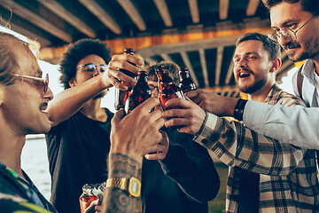 Image showing Group of friends celebrating, resting, having fun and party in summer day