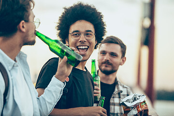 Image showing Group of friends celebrating, resting, having fun and party in summer day