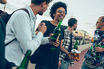 Image showing Group of friends celebrating, resting, having fun and party in summer day