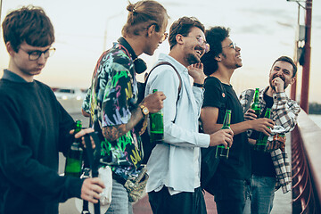 Image showing Group of friends celebrating, resting, having fun and party in summer day