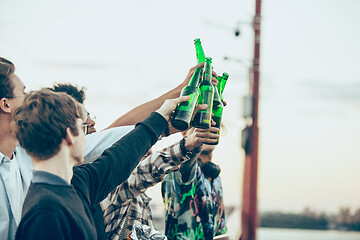 Image showing Group of friends celebrating, resting, having fun and party in summer day