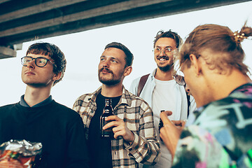 Image showing Group of friends celebrating, resting, having fun and party in summer day