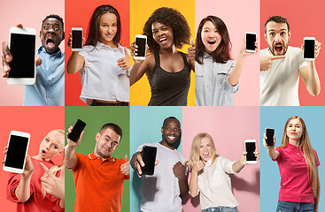 Image showing The collage about surprised, smiling, happy, astonished people showing blank screen of mobile phones
