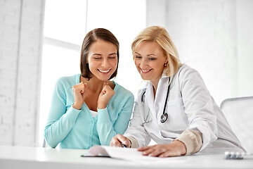 Image showing doctor happy woman patient at hospital