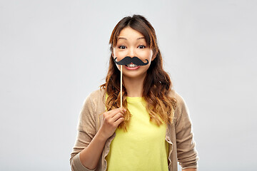 Image showing happy asian woman with big black mustache