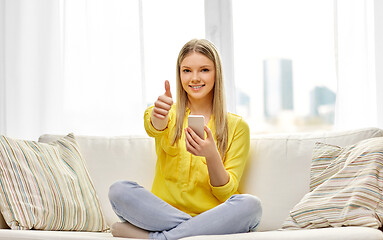 Image showing young woman or teen girl with smartphone at home