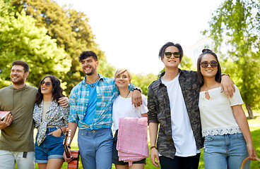 Image showing friends with guitar going to picnic at park