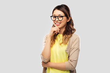 Image showing happy asian woman in glasses or student