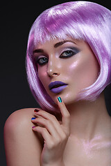 Image showing Beautiful girl in purple wig