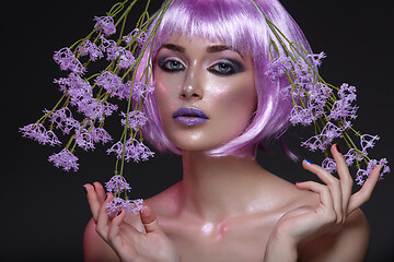 Image showing Beautiful girl in purple wig