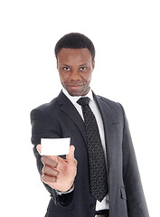 Image showing African businessman showing businescard