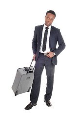 Image showing Business man in suit with suitcase