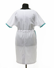 Image showing Female medical gown on a mannequin for clothes on a white background, rear view