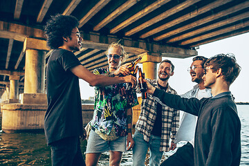 Image showing Group of friends celebrating, resting, having fun and party in summer day