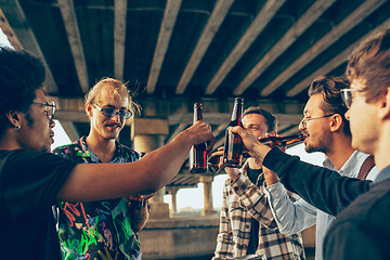 Image showing Group of friends celebrating, resting, having fun and party in summer day