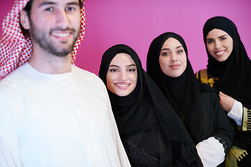 Image showing portrait of young muslim people isolated on pink