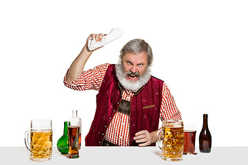 Image showing Expert barman with beer at studio