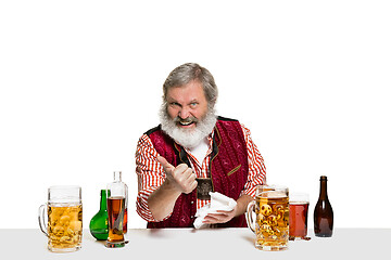 Image showing Expert barman with beer at studio