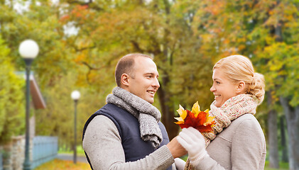 Image showing smiling couple in autumn park