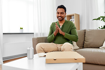 Image showing indian man looking inside of takeaway pizza box