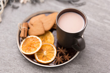 Image showing hot chocolate with dried orange, cookies and anise