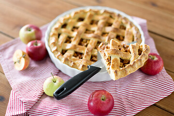 Image showing close up of apple pie piece on kitchen knife