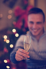 Image showing young man with champagne glass  on party