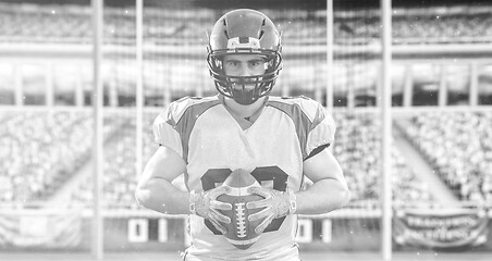 Image showing American Football Player isolated on big modern stadium field