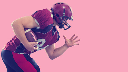 Image showing American football Player running with the ball