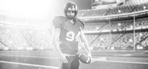 Image showing American Football Player isolated on big modern stadium field