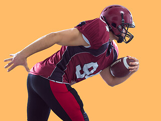 Image showing American football Player running with the ball