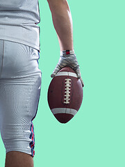 Image showing closeup American Football Player isolated on colorfull backgroun