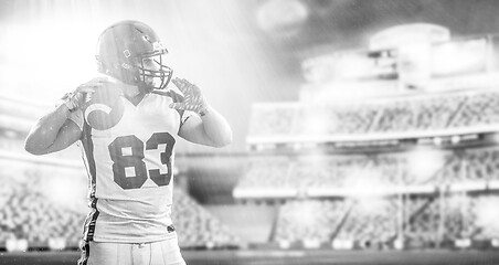 Image showing American Football Player isolated on big modern stadium field