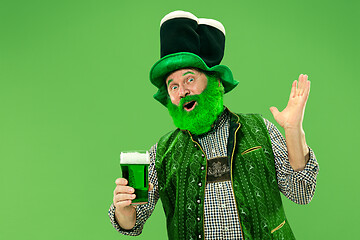 Image showing A man in a leprechaun hat at studio. He celebrates St. Patrick\'s Day.