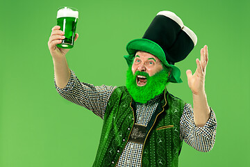 Image showing A man in a leprechaun hat at studio. He celebrates St. Patrick\'s Day.