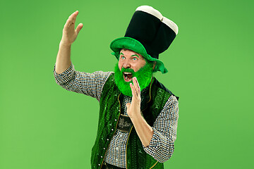 Image showing A man in a leprechaun hat at studio. He celebrates St. Patrick\'s Day.