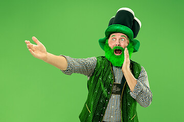 Image showing A man in a leprechaun hat at studio. He celebrates St. Patrick\'s Day.