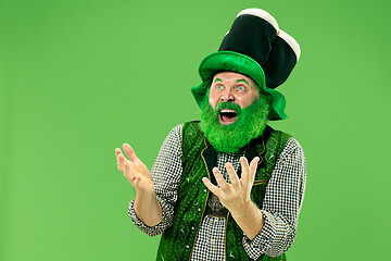 Image showing A man in a leprechaun hat at studio. He celebrates St. Patrick\'s Day.