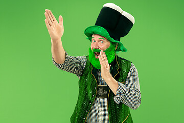 Image showing A man in a leprechaun hat at studio. He celebrates St. Patrick\'s Day.