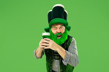 Image showing A man in a leprechaun hat at studio. He celebrates St. Patrick\'s Day.