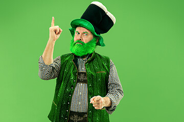 Image showing A man in a leprechaun hat at studio. He celebrates St. Patrick\'s Day.