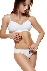 Image showing Perfect slim toned young body of the girl .