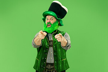 Image showing A man in a leprechaun hat at studio. He celebrates St. Patrick\'s Day.