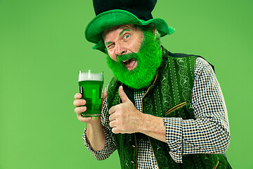 Image showing A man in a leprechaun hat at studio. He celebrates St. Patrick\'s Day.