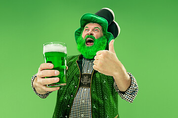 Image showing A man in a leprechaun hat at studio. He celebrates St. Patrick\'s Day.