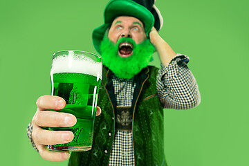 Image showing A man in a leprechaun hat at studio. He celebrates St. Patrick\'s Day.