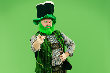 Image showing A man in a leprechaun hat at studio. He celebrates St. Patrick\'s Day.