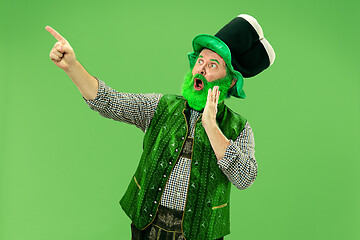 Image showing A man in a leprechaun hat at studio. He celebrates St. Patrick\'s Day.